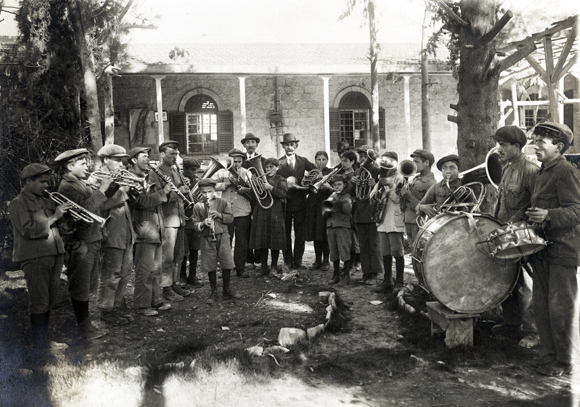 The Jewish Blind Institute (Beth Chinuch Ivrim) in Jerusalem was one of the existing institutions revived by JDC's subsidies. Classes for students 6-16 included weaving, writing, and music. Girls played piano and string instruments, and boys played wind instruments. Palestine, c. 1921, <em>NY_00089</em>.
