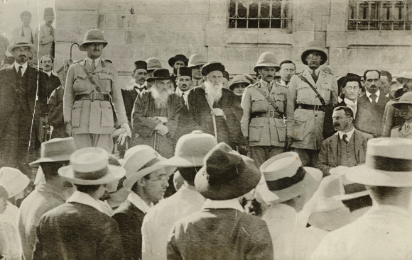 In May, 1918, the Zionist Commission and Jewish community of Jerusalem held a reception for General Sir Edmund Allenby, leader of the British military campaign. With him were the commission head, Chaim Weizmann, fellow commissioners and British liaison officers, Major Ormsby-Gore and Major de Rothschild, and the Chief Rabbi of Jerusalem. Another commissioner, David de Sola Pool, became JDCs Palestine representative. Palestine, 1918, <em>NY_00174</em>.
