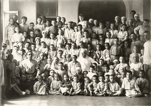 Among the organizations participating in the Soviet Committee to aid pogrom victims were some that had received JDC funds for years: the Jewish Committee to Aid War Victims (EKOPO), the Society for Crafts and Agricultural Labor among Jews  in Russia (ORT), and the Society for Health Care of the Jewish Population (OZE). A Kiev home for orphans of the May 1920 pogroms. Most were refugees from nearby small towns. Ukraine, c. 1920, <em>NY_00430</em>.

