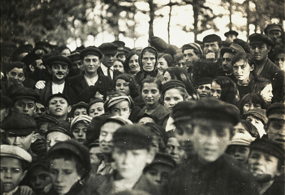 The sight of JDC workers bringing food drew attention from hungry villagers in Dachowa. Where 500 Jewish homes stood before the war, fewer than ten remained. JDC would soon provide reconstruction help as well as immediate aid. Poland, c. 1920-1921, <em>NY_01725</em>.
