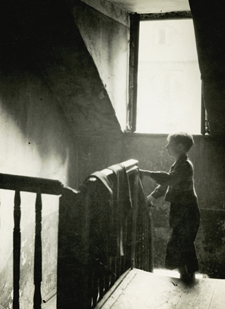 Bogen arrived in Poland in November 1918 to study the needs and problems of Jews first-hand and begin to construct a more direct approach to relief distribution. In reports, he described his first impressions, including the disturbing sight of starved and homeless children: “If we asked one where he lived, he could not say, he could only tell us where he slept, under the steps of some house, he knew not where.” <em>AR 19-21, File 17</em>. One of the children left homeless and orphaned by war. Poland, c. 1919, <em>NY_02009</em>.      
