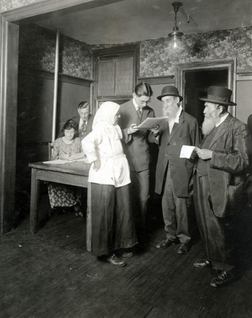 JDCs Personal Service Department brought the first word of missing family or friends in years to European and American Jews alike. In the New York office, people pored over lists of refugees recently reached by American Jewish relief agents in Poland.  Poland, c. 1920, <em>NY_03503</em>.
