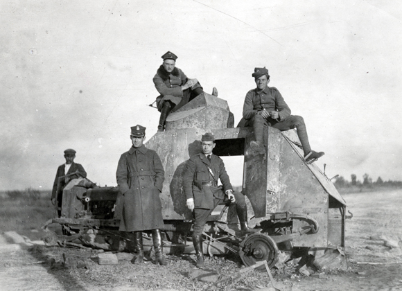 The ongoing war between Poland and Russia made travel to precarious border towns especially dangerous. On a trip to Brest, Kovel, Kobryn, Domoczowe, Kamianitz Lit, Luck, Vilna, Brody, Lvov, Lublin, and Warsaw, JDC staffer Abraham Zucker and his Polish guards ran into vehicle trouble only 8 miles from the front line. Poland (now Belarus, Ukraine, Lithuania, and Poland), c. 1920, <em>NY_04637</em>.
