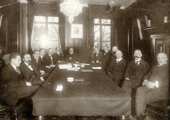 In August 1917, the new Holland Branch began its work. JDC sent Boris Bogen (sixth from left) and Max Senior (sixth from right) to supervise. With the help of Dutch diplomatic personnel all over the world, nearly $2 million was channeled to local committees in war-torn Jewish communities of Palestine and Europe. Holland, c. 1917, <em>Central News Photo Service, NYC, NY_36298.</em> Note: Among those crucial to JDCs early development, Boris Bogen has been singled out for this exhibit. His involvement in events of that time reflected JDCs evolving role.
