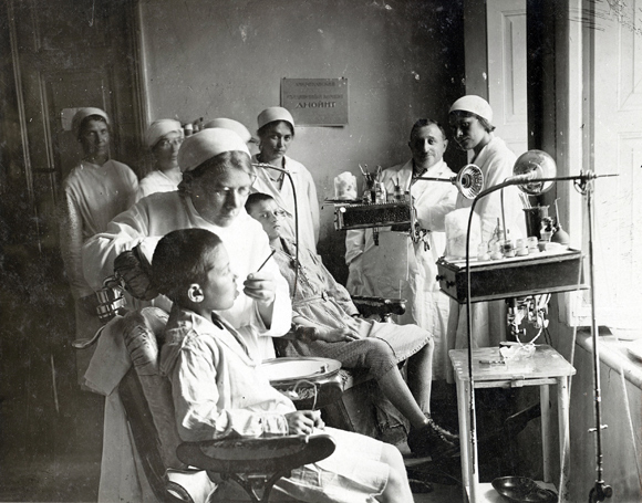 Agro-Joint organized programs on the principal of self-sufficiency and mutual support as far as possible. The shops it set up to train skilled workers produced the medical equipment used by its health clinics. Dental equipment made in a Kiev school-factory provided clinics with tools and financed medical aid for Jewish déclassés. Children in Odessa got check-ups through this ambulatory dental program. Ukraine, c. 1925, <em>NY_00456</em>.