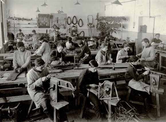 Preparatory classes for new students were attached to the already well-equipped Agro-Joint technical schools in large cities, like Odessa and Kiev. This harness-making class in Kiev was one of many designed to turn declassed poor Jews into skilled workers. Ukraine, c. 1928, <em>M. Z. Tashker, NY_00541</em>.