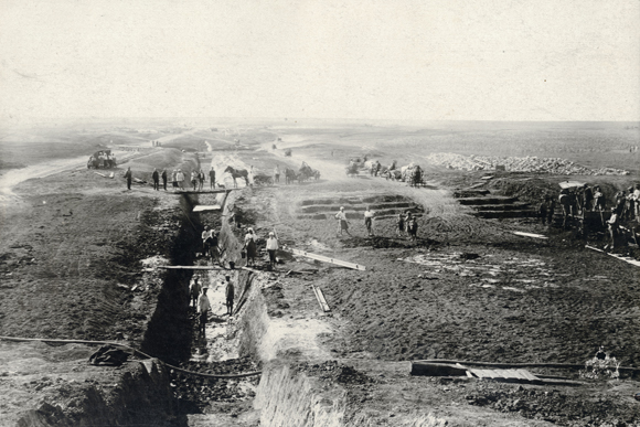 One crucial advance Agro-Joint brought to agricultural development in the Soviet Union was an increased, reliable flow of water. Electrification, irrigation, and other methods for harnessing water carried out throughout the semi-arid lands of Crimea, and in the Krivoy Rog and Kherson districts of the Ukraine, opened up new areas to cultivation. The Kamenka Dam project irrigated some 1,500 acres in the Krivoy Rog District. Ukraine, c. 1935, <em>NY_00740</em>.