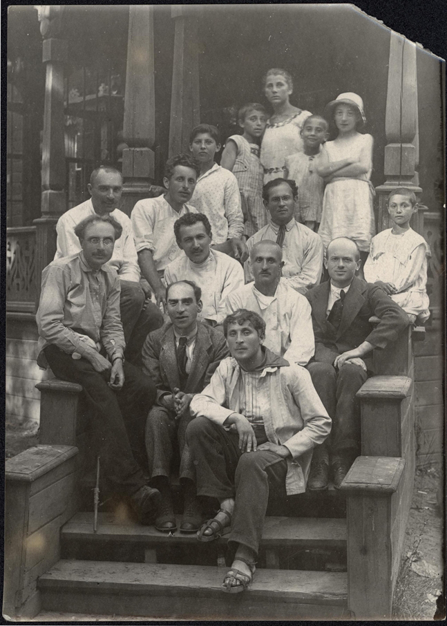 The painter Marc Chagall, in front, with other teachers and children at the Third International Jewish School-Camp for War Orphans in 1921.